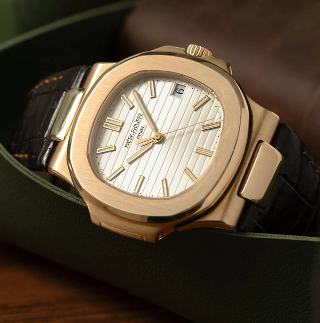 Patek Philippe Nautilus 18K Yellow Gold with brown leather strap watch