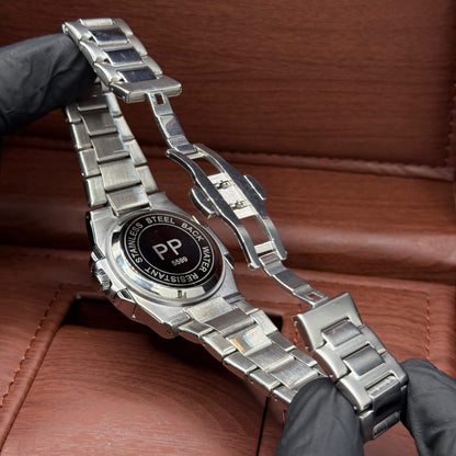 Patek Philippe silver with blue dial with date