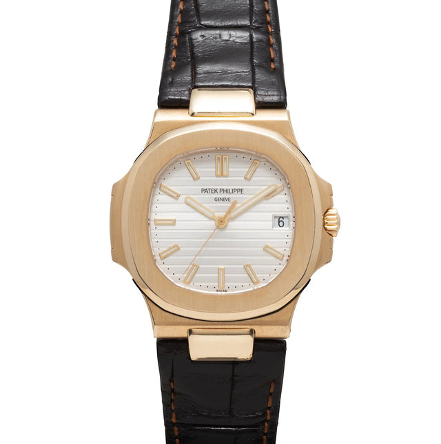 Patek Philippe Nautilus 18K Yellow Gold with brown leather strap watch